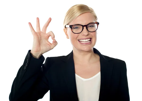 Successful business woman posing with ok sign — Stock Photo, Image