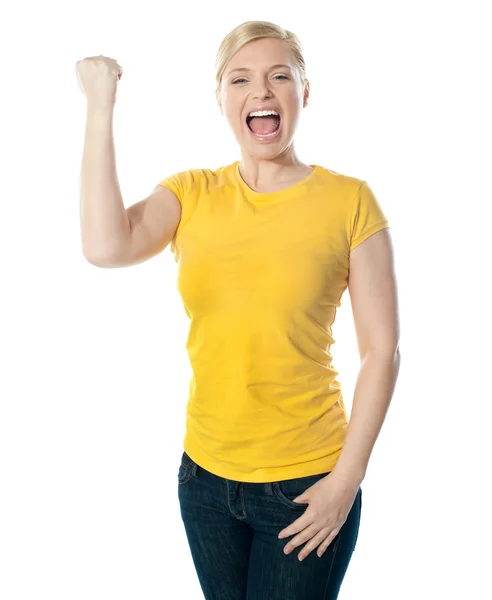 Fashionable teenager poisng with raised arms — Stock Photo, Image