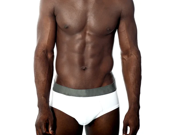 Sexig naken ung man poserar i underkläder — Stockfoto
