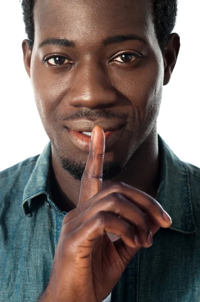 Silence gesture by a young guy, closeup view — Stock Photo, Image