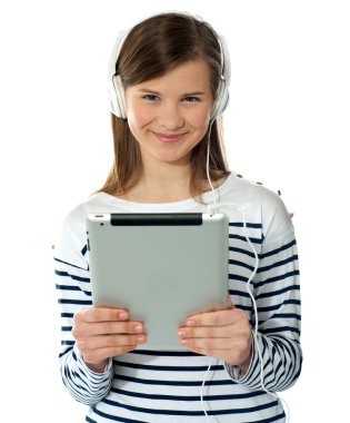 Smiling pretty girl holding i-pad clipart