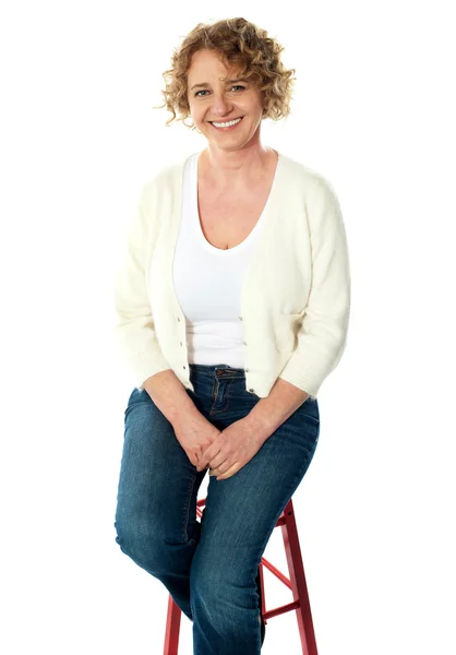 Full length view of seated senior woman — Stock Photo, Image