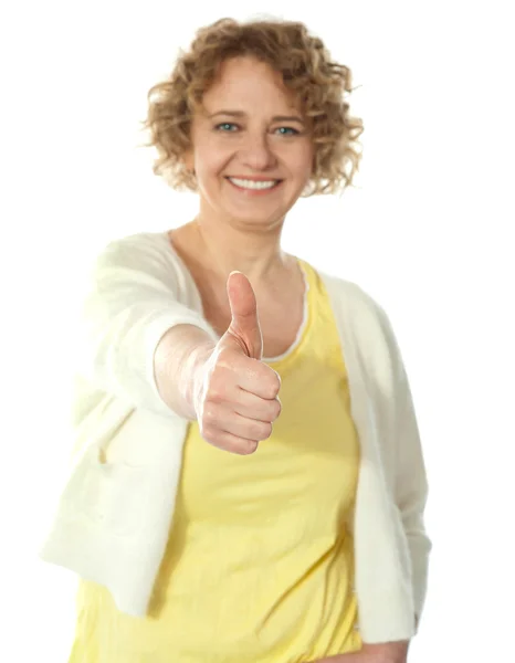 Glamorous woman gesturing thumbs-up — Stock Photo, Image