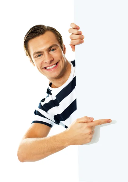 Handsome person pointing towards blank signboard — Stock Photo, Image