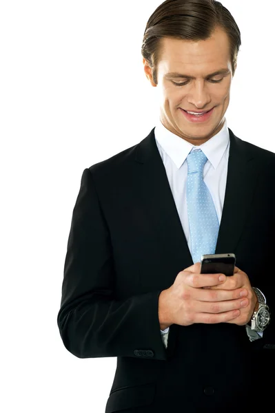 Confident businessperson messaging — Stock Photo, Image