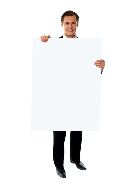 Business executive promoting big blank banner ad Stock Image
