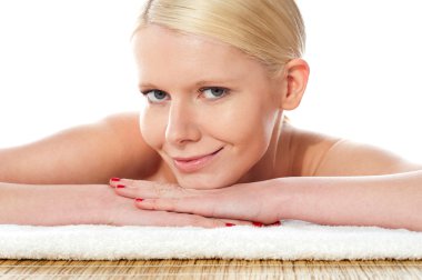 Closeup shot of a pretty cute female at spa clipart