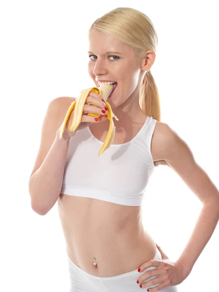 일부 하려면? 바나나를 먹고 굶주린 섹시 한 여자 — 스톡 사진