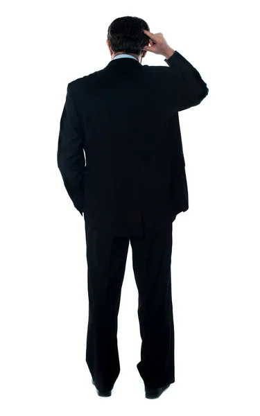 Rear view of corporate person thinking — Stock Photo, Image