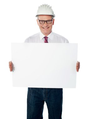 Businessman architect holding a blank white signboard clipart