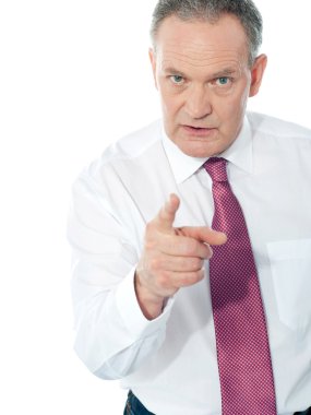 Portrait of an angry middle aged businessman clipart