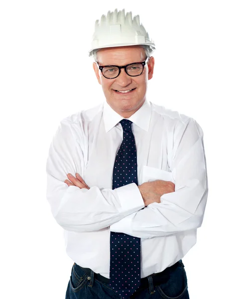 Portrait of happy senior foreman with hard hat — Stock Photo, Image