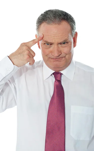 Confused matured corporate man — Stock Photo, Image