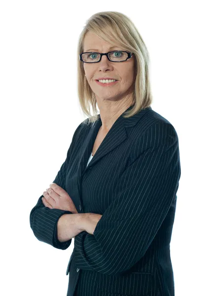 Senior female manager posing with arms crossed — Stock Photo, Image