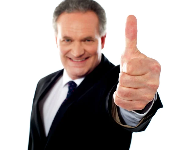 Successful entrepreneur gesturing thumbs-up — Stock Photo, Image