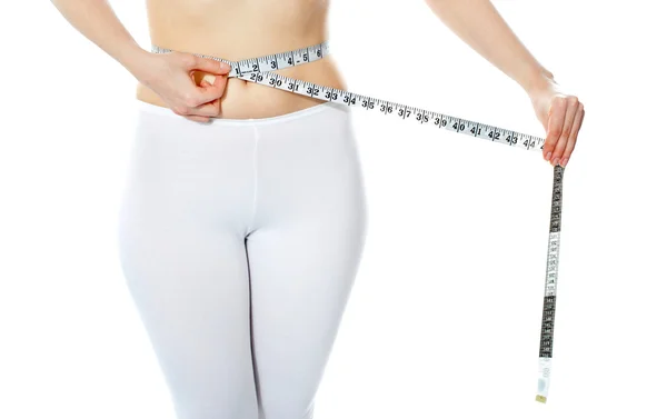 Woman measuring her abdomen — Stock Photo, Image