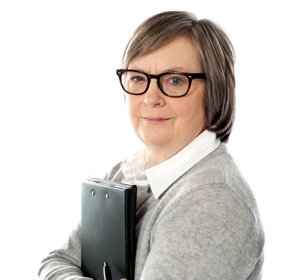 Attractive old orporate lady holding business document — Stock Photo, Image