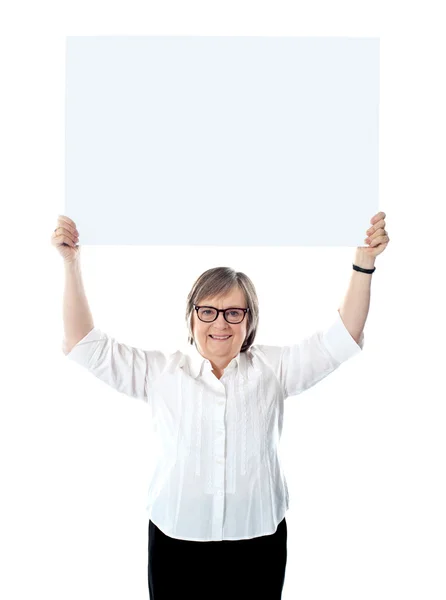 Woman with blank billboard over her head — Stock Photo, Image
