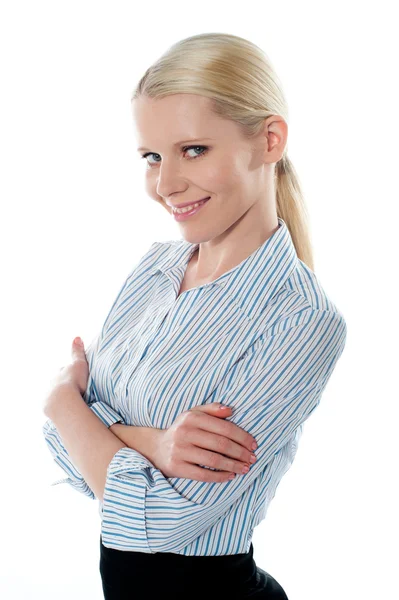 Saleswoman posing in style, arms-folded — Stock Photo, Image