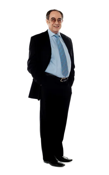 Full pose of a smiling senior company director — Stock Photo, Image