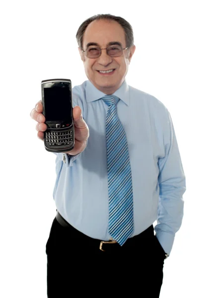 Senior sales manager promoting blackberry — Stock Photo, Image
