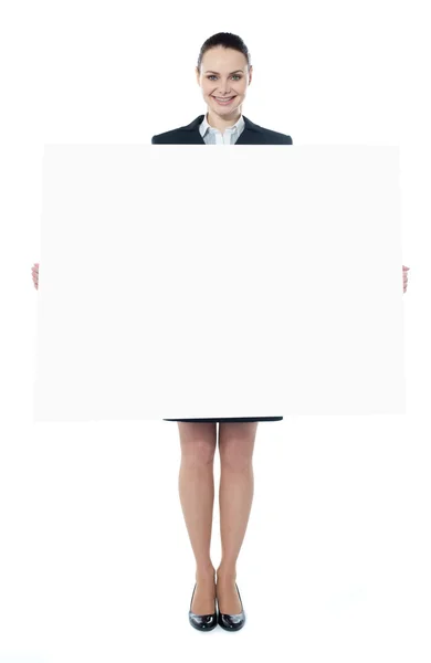 stock image Confident young executive with an advertising board