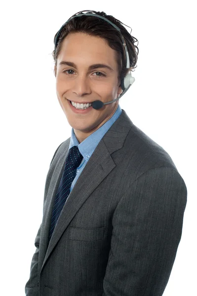 Male customer service representative smiling — Stock Photo, Image
