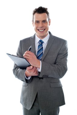 Businessman with clipboard clipart