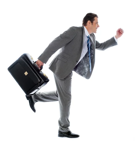 Biznesmen biegnący z walizką — Zdjęcie stockowe