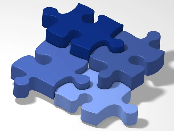 Vier blauwe stukjes van puzzel — Stockfoto