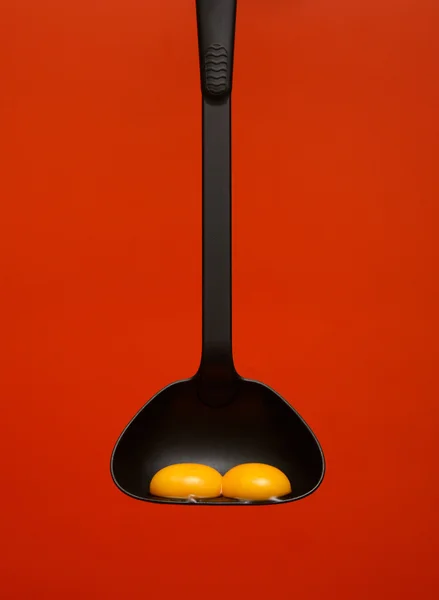 Eggs on a red background — Stock Photo, Image