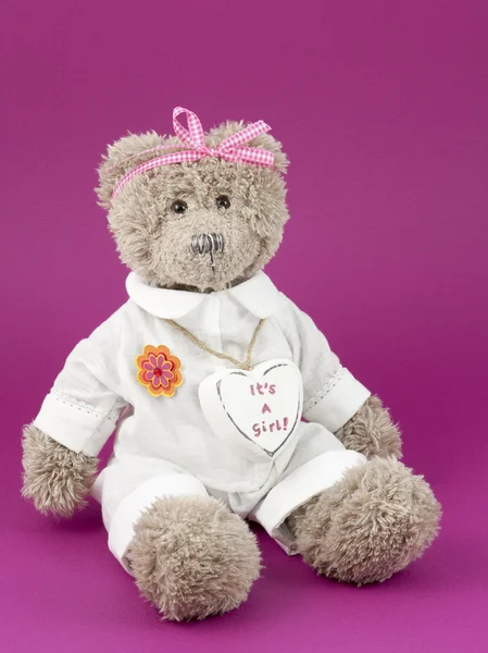 Teddy bear girl with a heart