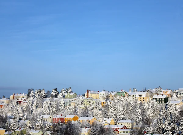 Hill ve mavi gökyüzü evleri Stok Resim