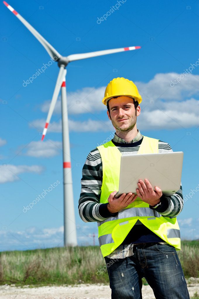 Technician Engineer in Wind Turbine Power Generator Station Stock Photo