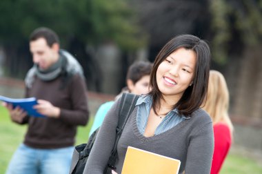 Multicultural College Students at Park clipart