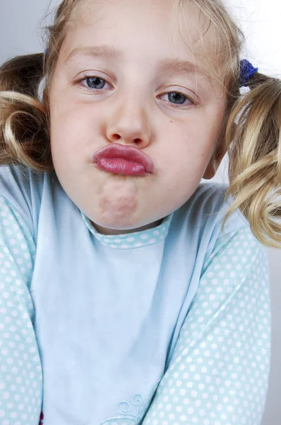 Girls in pajamas makes faces — Stock Photo, Image