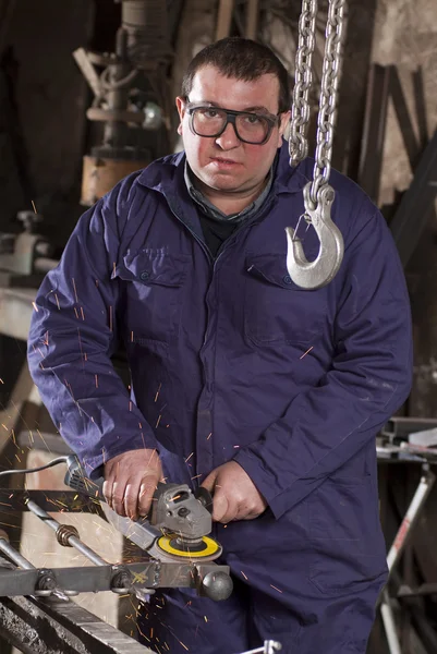 Blacksmith in his workshop — Stock Photo, Image