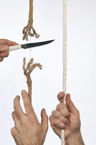 Cutting a rope — Stock Photo, Image