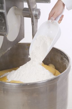 Pastry Chef prepares the ingredients clipart