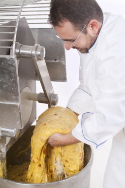 Pastry Chef prepares the ingredients clipart