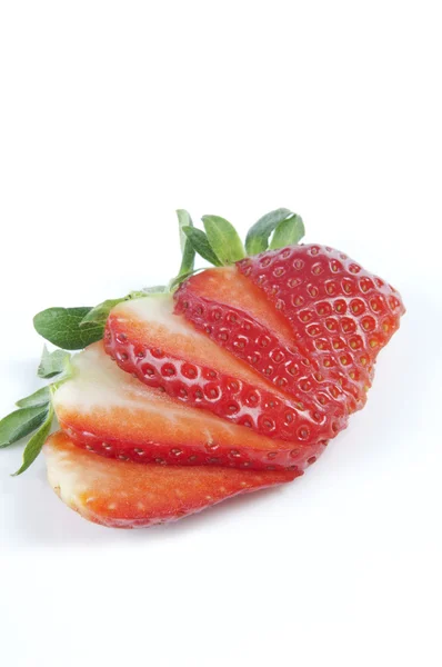 Cut strawberry on a white background — Stock Photo, Image