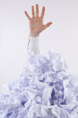 Businessman overwhelmed by paper clipart