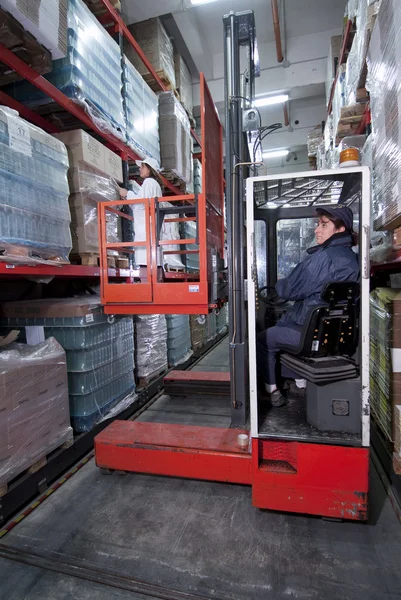 stock image Forklift in a warehouse