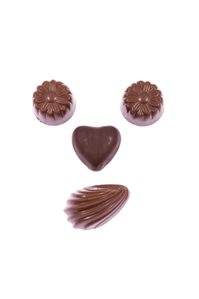 Milk chocolate smile isolated on white background — Stock Photo, Image