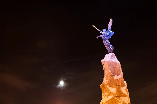 stock image Moon and mermaid statue at night