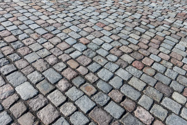 Strada asfaltata con pietre — Foto Stock