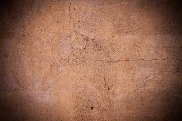 Cracked brown concrete wall texture — Stock Photo, Image