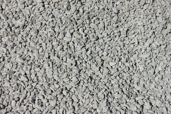 Veel kleine grijsachtig stenen — Stockfoto