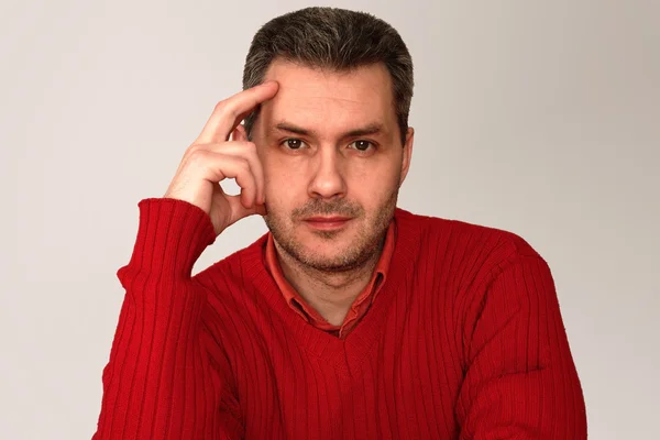 Portrait of man in red sweater — Stock Photo, Image