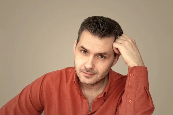 Portrait of dark-haired man Stock Photo